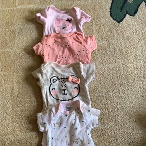 Newborn short sleeve Gerber bodysuits.